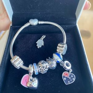 Pandora bracelet and with 7 charms